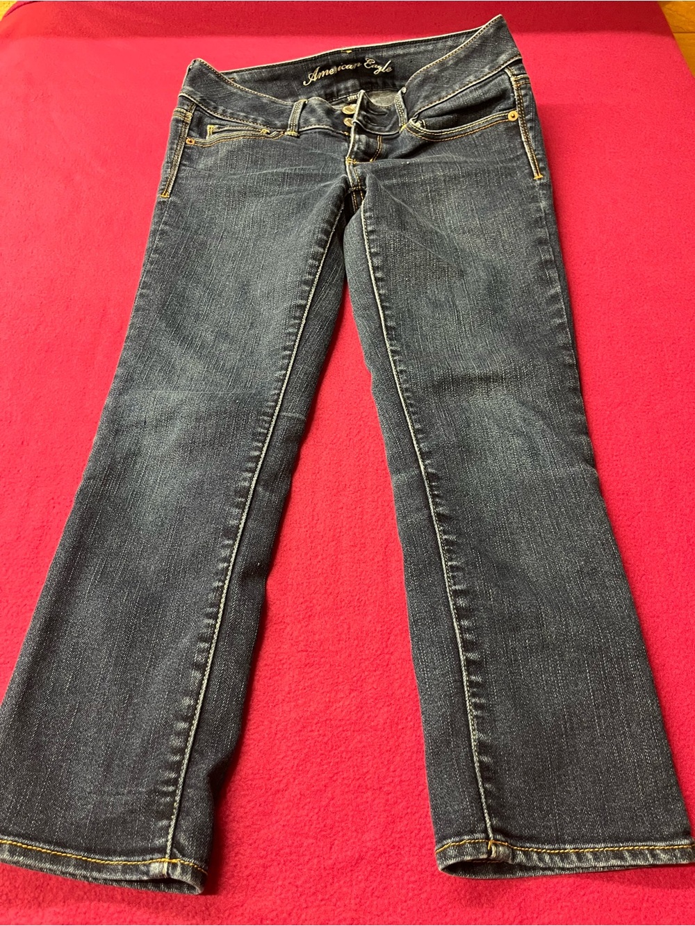 American Eagle Outfitters Dark Indigo Flare Jeans with Gold Stitching